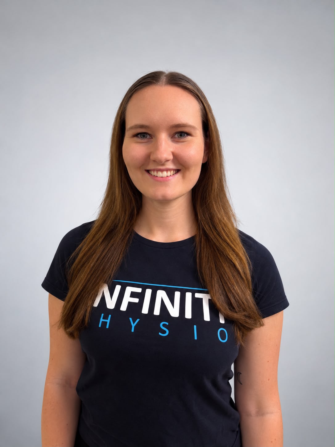 Porträt von Melanie, Physiotherapeutin bei INFINITI